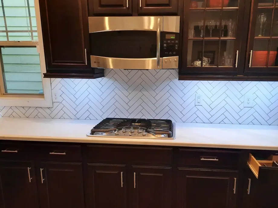 Kitchen remodel with new backsplash